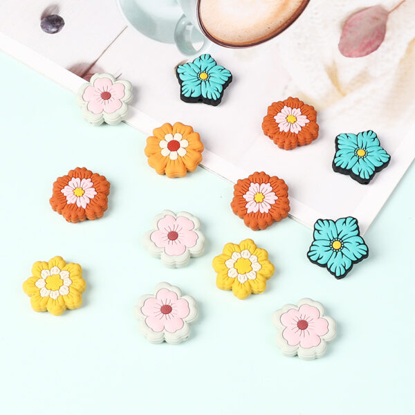 Wholesale New silicone flower bead DIY bracelet material kit, featuring cartoon children's beads and straight-hole silicone beads.