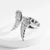oly-fdb8a6cb2b655d5ed70c94e4f46429fe Wholesale PVD Coated Real Gold Plated 14K Gold Hand Heart Shape Wings 304 Stainless Steel Retro Roman Style Waterproof Non Tarnish Open Rings