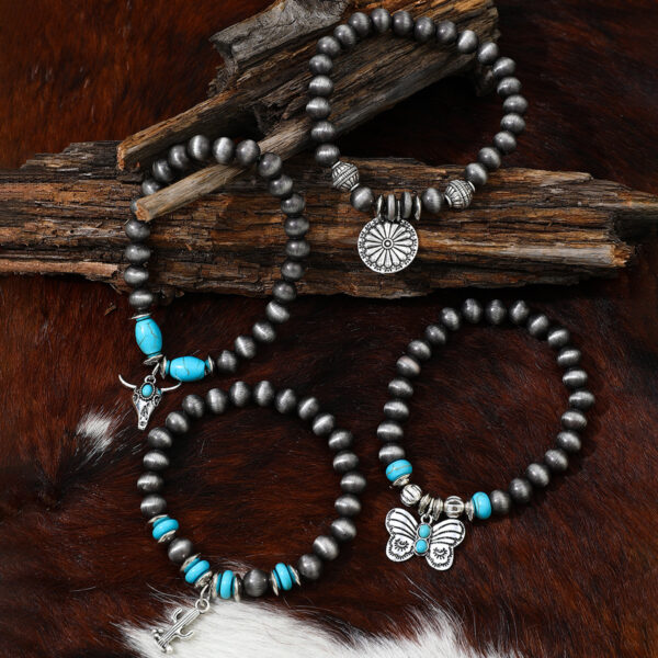 Wholesale Imitation pearl cactus butterfly bull's head flower elastic bracelet, vintage turquoise patchwork CCB bracelet set for women.