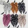 Wholesale New Halloween hair accessories featuring pumpkin skulls, ghost hands, and bows; spring clips for party decorations.