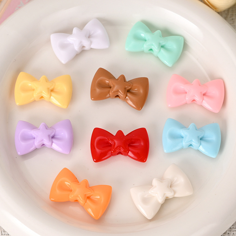 Wholesale Cute macaron-colored perforated five-inted star bow tie beaded bracelet