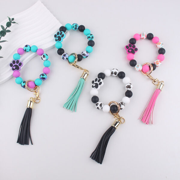 oly-ff544ee1ea2fb617695a3a19908c32b6 Wholesale Temu Amazon Cross-Border Silicone Dog Paw Print Keychain Bracelet Bracelet Wallet Keychain Pendant