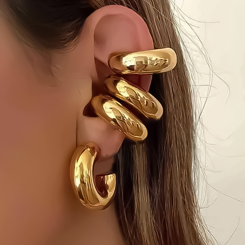 Wholesale European and American cross-border new fashion thick cylinical round tube hollow ear clip earrings simple plated 18K earless ear bone clip