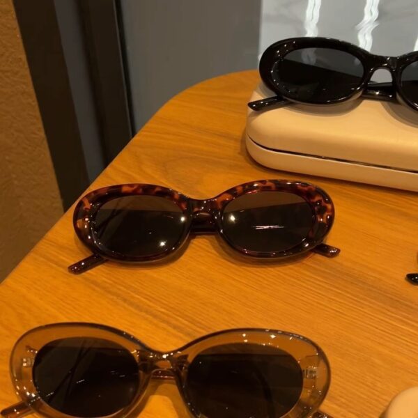 Wholesale Oval white frame sunglasses European and American concave sunglasses Women's Big Face cat eye sun protection high-grade ins slimming