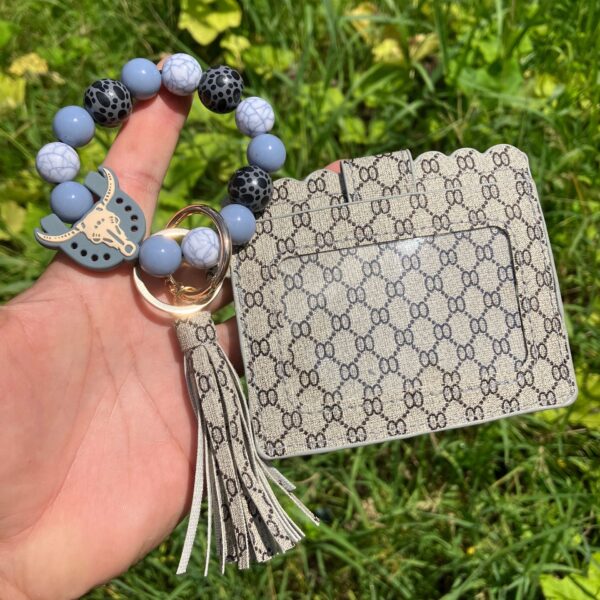 oly-ffa9f6c278421d2730c3ba63020096ba Wholesale Women's Printed PU Leather Coin Purse Wrist Keychain