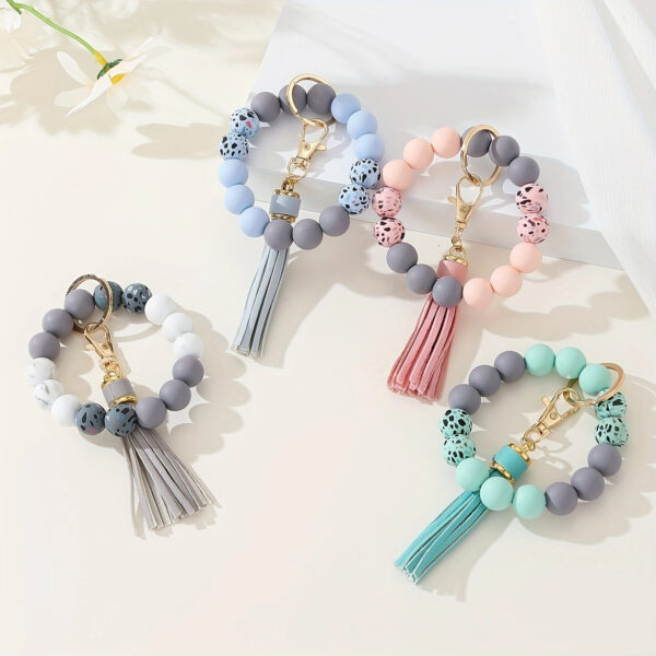 Wholesale Printed silicone bead bracelet keychain magic camouflage water turn silicone wrist bracelet key ring pendant