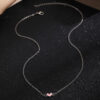 oly-ffc66fc9d439fa55bc4a6c2e6fce5c49 Wholesale Versatile heart necklace with a simple yet sophisticated peach heart pendant