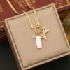 Wholesale 18K Gold Real Gold Plated 304 Stainless Steel Ion Plating (IP) Zircon Heart Shape Bow Knot Waterproof Non Tarnish Elegant Pendant Necklace For Women's