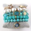oly-010e1156d0c16ca59aa0470bae2e0494 Wholesale Pearl turquoise blue stone alloy nail bracelet natural stone crystal glass bead bracelet elastic elastic folding hand