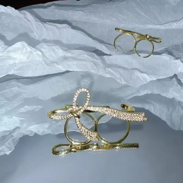 Wholesale Fashion Light Luxury INS Style Copper Color Retention Electroplated Micro Inlaid Zircon Eight-Pointed Star Ribbon Light Open Ring Water Plated 18K Real Gold