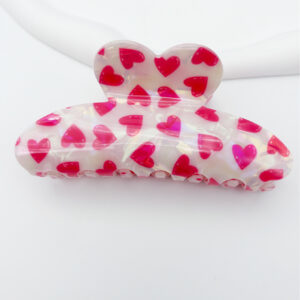 Pink heart shape on white background