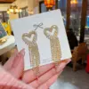 Wholesale 1 Pair Glam Heart Shape Copper Inlay Zircon Drop Earrings