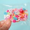 oly-0541ce80d508810efb92f5574f7c0ccd Wholesale Pack 10g Soft Pottery Sliced Chocolate Silk Food Play Cake Sugar Grain Decoration DIY Cream Gel Nail Art Accessories