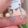 Wholesale Electroplated Brass Earrings For Women Featuring Silver Plated Finish And Pearl Inlay With Elegant Flower Design