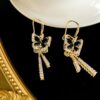 oly-06acd36a3942e8eccb27eebcde5dca9e Wholesale Black butterfly earrings high-grade light luxury slightly elegant all-match earrings earrings niche design