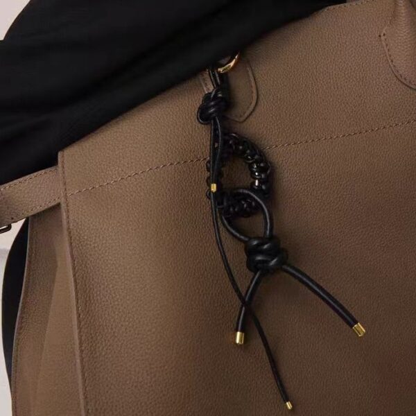 oly-085bd7167d38f74959e8d43ea961b38c Wholesale selling high-end all-match jewelry pendant trend woven bag mobile phone case key chain pendant