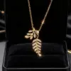 Wholesale 1 Piece Vintage Leaf Hollow Water Drop Plated Imitation Gold Zircon 304 Stainless Steel Winter Christmas Necklace Pendant