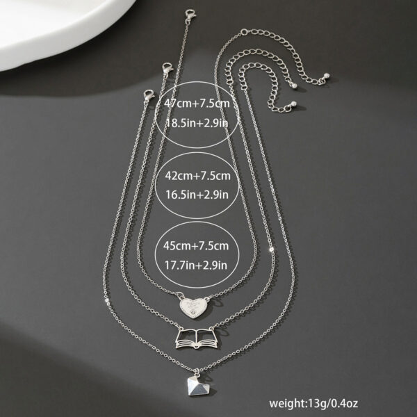 oly-09ae9e922160a352826876d41b05e4fd Wholesale 3 fashionable exquisite metal love book three-dimensional heart pendant literary temperament ladies necklace suit