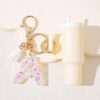 oly-09cc80ffbdd6bb41590422caa91df749 Wholesale Mixed color rose red sequins English letter key chain resin 26 letters in stock women charm key chain