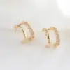 Wholesale Three-dimensional Geometric Earrings In Copper With 14K Real Gold Plating And Zircon Inlay, Featuring 925 Sterling Silver Studs
