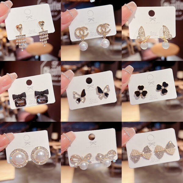 Wholesale Copper and silver needle Chanel-style stud earrings with diamonds, pearls, and zircon stones