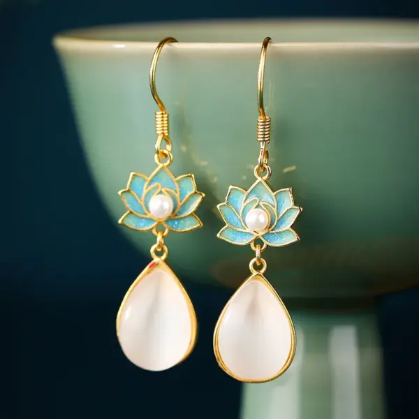 Wholesale Lotus Earrings For Women In Golden Plated Copper Featuring Freshwater Pearl Inlay