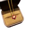 Wholesale Copper zircon four-leaf clover necklace, bracelet, and earrings set with red corundum, aquamarine, and white diamonds.
