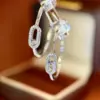 Wholesale C Shape Earrings For Women Featuring Bezel Setting Zircon Inlay Made Of Brass With 18K Real Gold Plated Finish