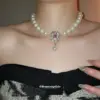 Wholesale Flowers Pendant Necklace For Women With Alloy Pendant Material Featuring Imitation Pearl And Rhinestones In White