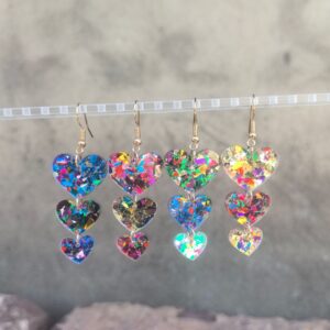 oly-0f40fd1d827443369e045596ac11d376 Wholesale Cross-border European and American acrylic sequins asymmetric heart-shaped triple love personality simple retro earrings earrings color