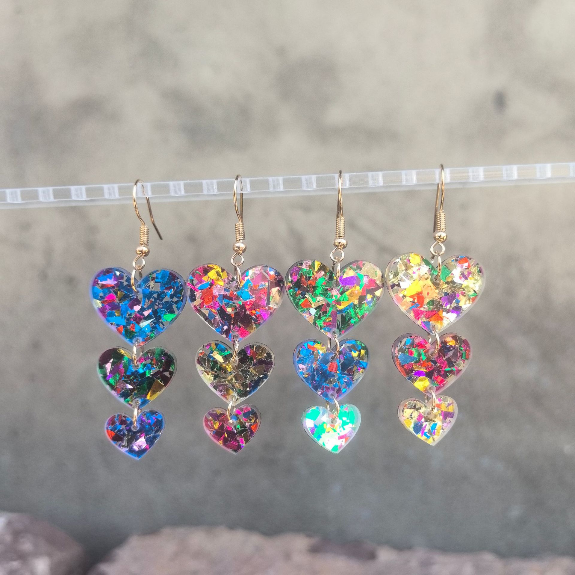 Wholesale Cross-border European and American acrylic sequins asymmetric heart-shaped triple love personality simple retro earrings earrings color