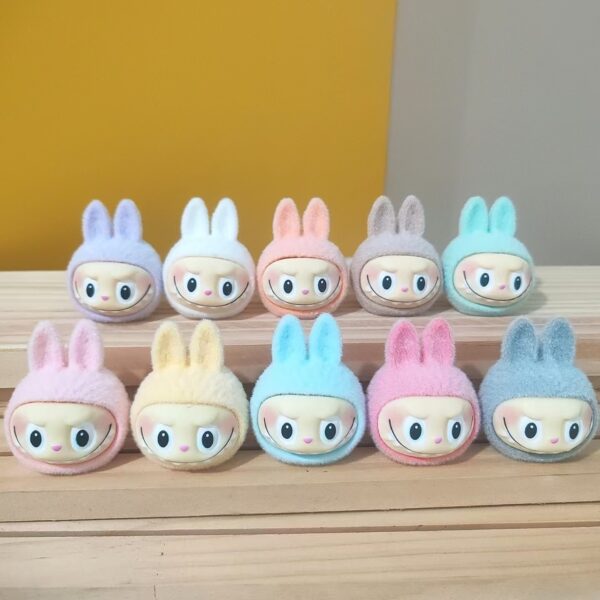 Wholesale cartoon flocking resin small pendant cloth ugly cute doll doll blind box small gift