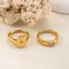 Wholesale Unisex Starburst Ring In Titanium Steel With Real Gold Plated Finish And Zircon Inlay,