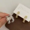 oly-0ff89de7de307bfd1b5d2bf9932f5b0d Wholesale Copper Zircon Geometric Elegant Streetwear Earrings For Women's