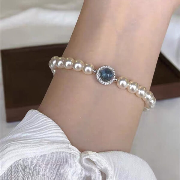 oly-10105bbb327e1cfbd7d05c66425c95d3 Wholesale Mermaid's tears navy blue sapphire artificial pearl beaded bracelet Year light luxury niche design bracelet