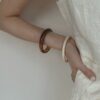 oly-101c2fa6c0849396e049808f618c6649 Wholesale Bracelet for Women ins Niche Design High-end Accessible Luxury Cold Style Retro Acetate Amber Pattern Acrylic Bracelet