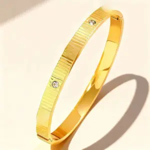 47-B-6 Gold Striped Bracelet with One Stud and One Diamond
