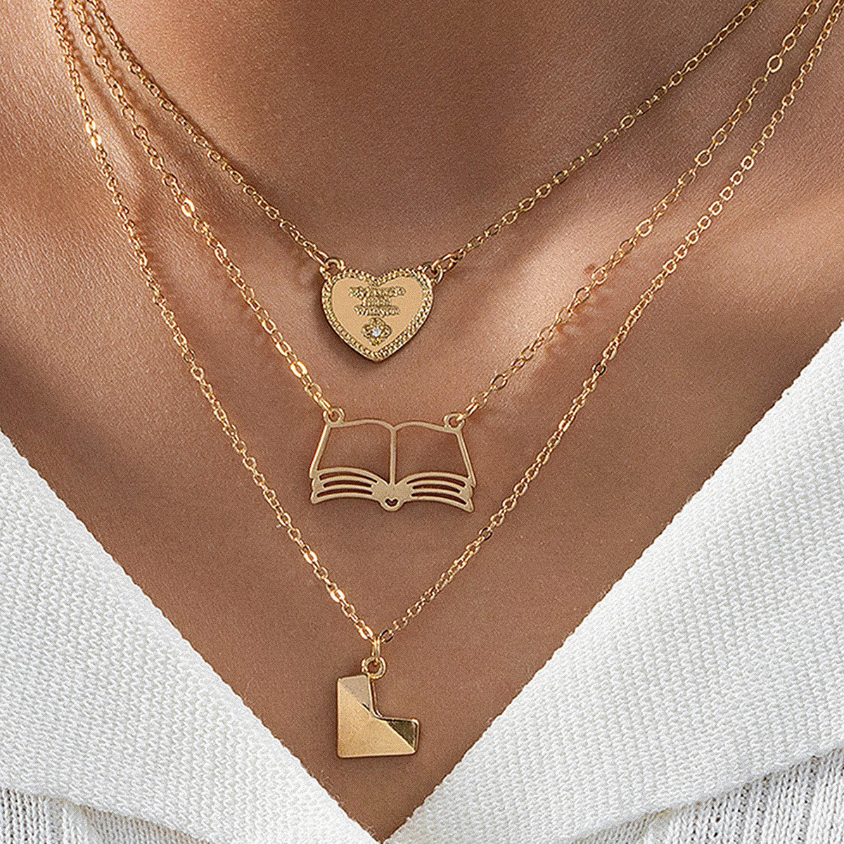 Wholesale 3 fashionable exquisite metal love book three-dimensional heart pendant literary temperament ladies necklace suit