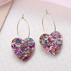 Pair of pink glitter love earrings