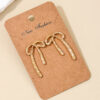 Wholesale 1 Pair Ig Metal Style Simple Spring and Summer Earrings Hollow Bow Women Commuter Earrings Earrings Stud