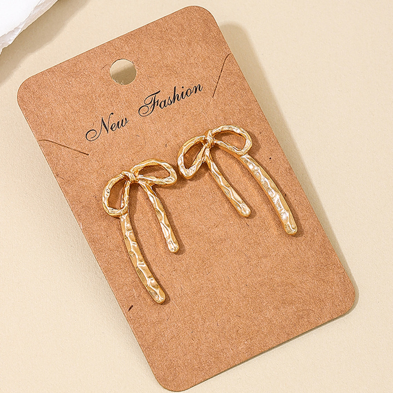 Wholesale 1 Pair New Ins Metal Style Simple Spring and Summer Earrings Hollow Bow Women Commuter Earrings Earrings Stud