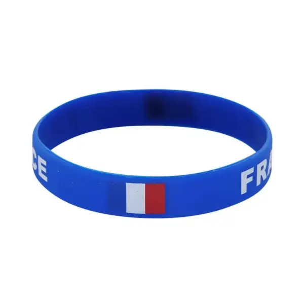 oly-152d1f6bba06bc4735f94c21de794c9a Wholesale Multicolor Nordic Style Asymmetrical National Flag Wristband In Silica Gel With Nylon Chain Material For Couples