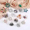 Wholesale Korean Style Pin Number Flower Butterfly Imitation Pearl Alloy Crystal Enamel Inlay Artificial Gemstones Women'S Brooches