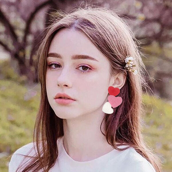 oly-15f29ccc492f8565b8a49da674aeda3f Wholesale fashion temperament handmade three heart rice beads irregular earrings earrings Valentine's Day