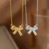 Wholesale Women’s Bow Tie Pendant Necklace With Inlay Artificial Rhinestones, 18K Real Gold Plated Copper, Water Plating On Cable Chain
