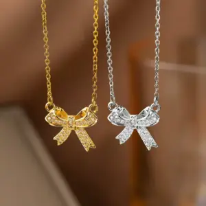 Wholesale Women’s Bow Tie Pendant Necklace With Inlay Artificial Rhinestones, 18K Real Gold Plated Copper, Water Plating On Cable Chain