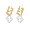Wholesale Hypoallergenic Letter Drop Earrings For Women With 0.03µm KC Golden Plated Copper And UV Plating