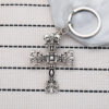 oly-17159e1b6a2042cd784c84819fadbead Wholesale Crow flame cross keychain niche punk retro do pendant car pendant