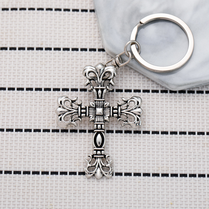 Wholesale Europe and the United States Crow flame cross keychain niche punk retro do pendant car pendant