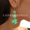 oly-17ab0d87020c8a5b97c8df62f1769e73 Wholesale St. Patrick's Day Earrings Carnival Personalized Green Acrylic Glitter Clover